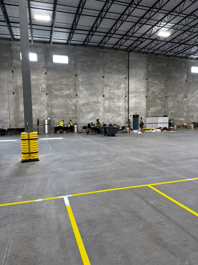 Inside a new warehouse in Hammond, Indiana: a clean concrete floor with yellow lane lines