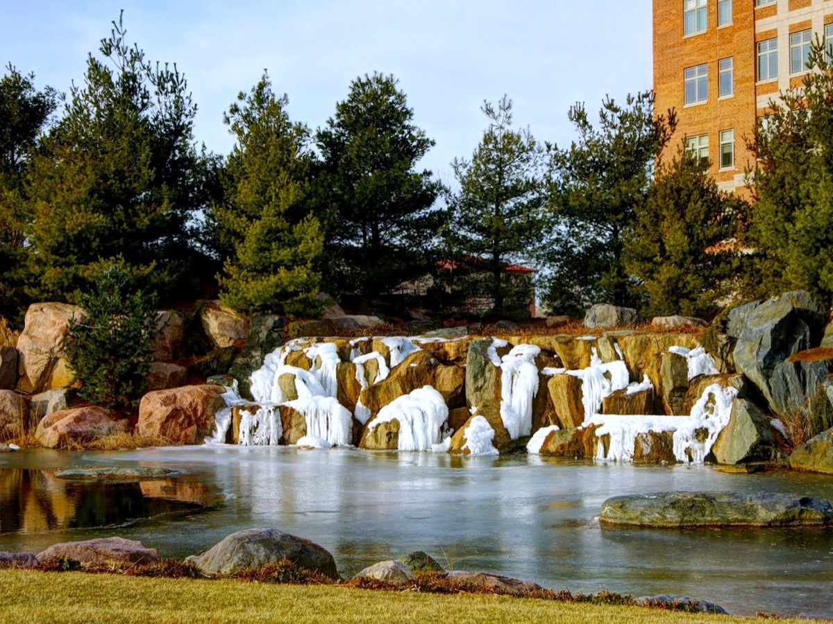 A waterfall and pond in Wheeling, Illinois. Photo: bogdanstepniak, CC BY 3.0, via Wikimedia Commons.